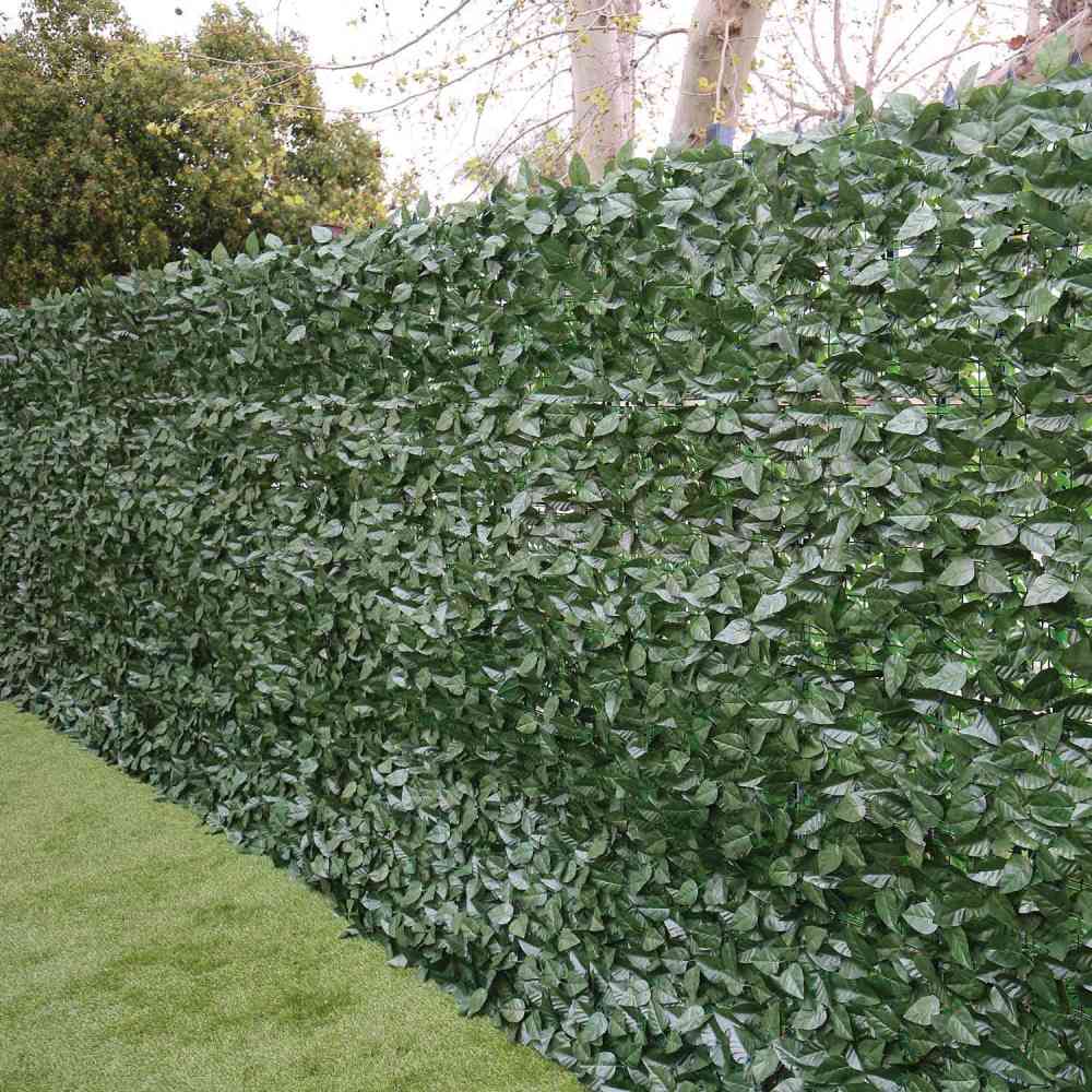 An artificial laurel hedge panel